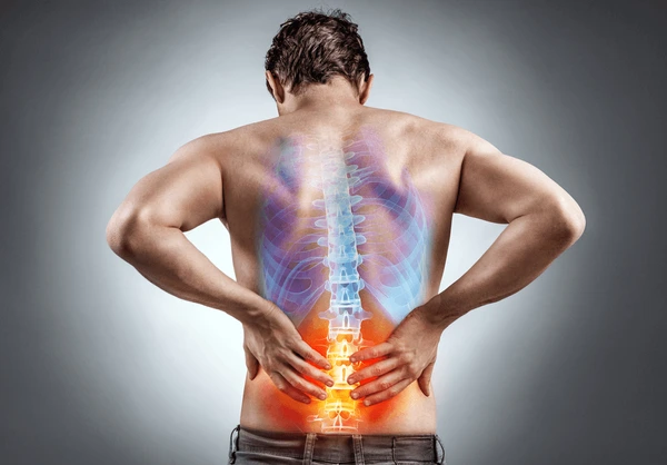 lower-back-pain-man-holding-600nw-732789853.jpg